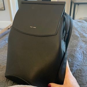 Pixie Mood black leather book bag.
